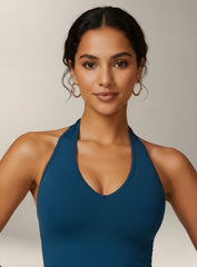 Vector Sportswear Essential Crop Top – Petroleum Blue, sleek V-neck activewear top designed for comfort, style, and movement.