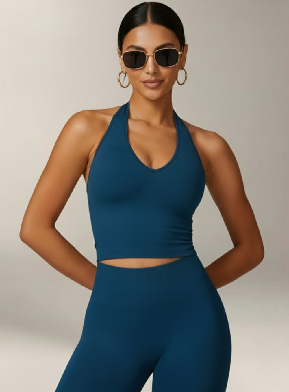 Vector Sportswear Essential Crop Top – Petroleum Blue, sleek V-neck activewear top designed for comfort, style, and movement.