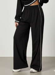 Vector Sportswear wide-leg lounge trousers with breathable fabric, elastic waistband, and versatile design.