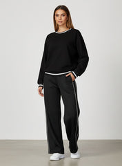 Vector Sportswear wide-leg lounge trousers with breathable fabric, elastic waistband, and versatile design.