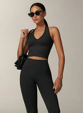 Vector Sportswear Essential Crop Top – Black, sleek V-neck activewear top designed for comfort, style, and movement.
