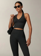 Vector Sportswear Essential Crop Top – Black, sleek V-neck activewear top designed for comfort, style, and movement.