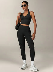 Vector Sportswear Essential Crop Top – Black, sleek V-neck activewear top designed for comfort, style, and movement.