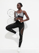 Women’s high-waisted black and white seamless leggings with lattice cutout detail- Vectorsportswear