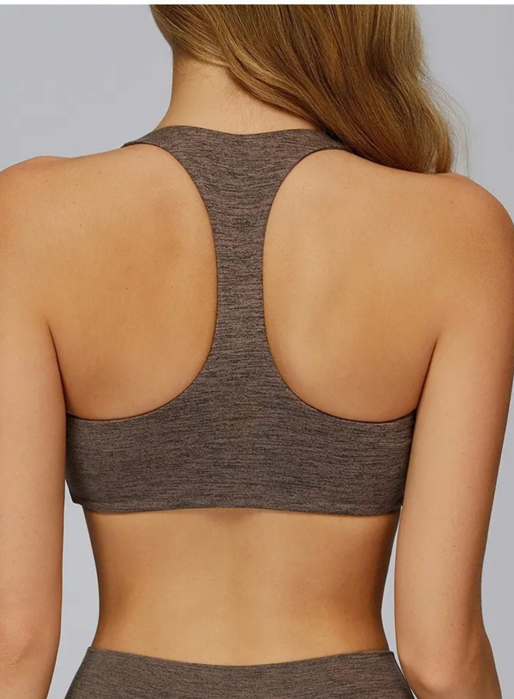 Athletic model in CloudSense seamless high-support workout bra, soft brushed performance fabric | Vectorsportswear