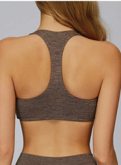 Athletic model in CloudSense seamless high-support workout bra, soft brushed performance fabric | Vectorsportswear