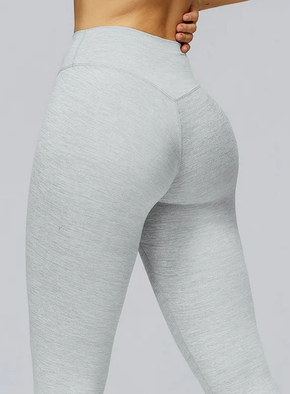 Athletic model in seamless brushed high-waist sculpt leggings, peach-lift and sweat-wicking | Vectorsportswear