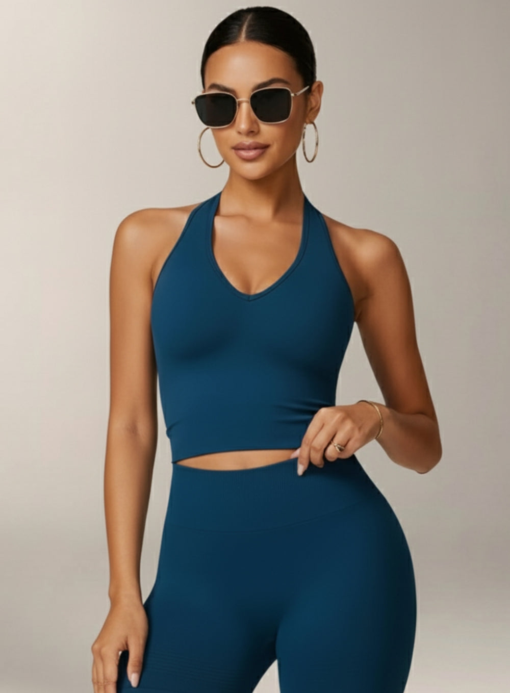 Vector Sportswear Essential Crop Top –  Petroleum Blue, sleek V-neck activewear top designed for comfort, style, and movement.