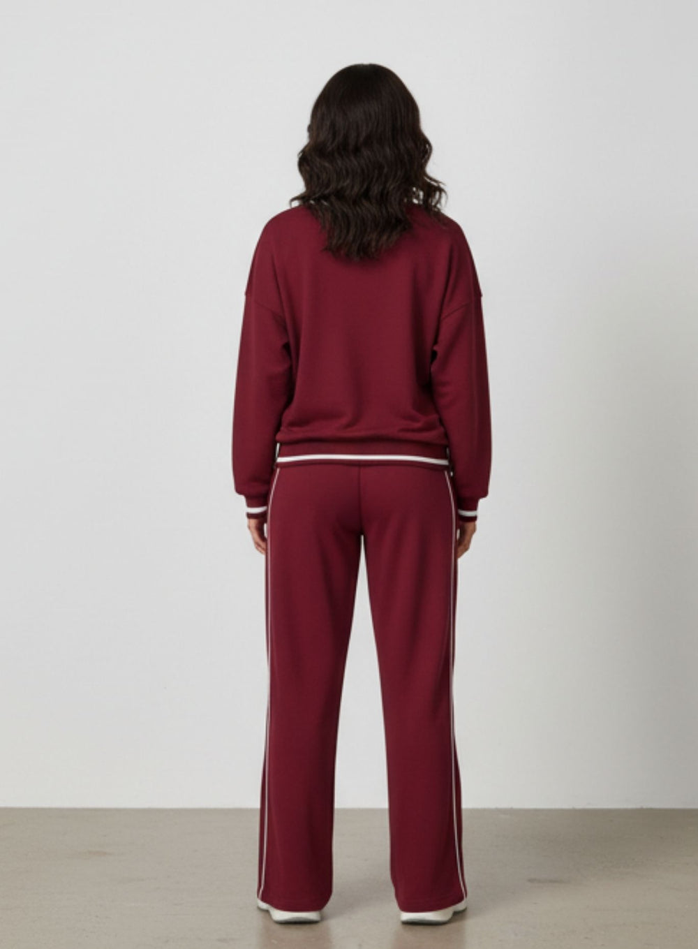 Vector Sportswear Lounge Strides pants featuring relaxed wide-leg fit, piping detail, and all-day comfort.