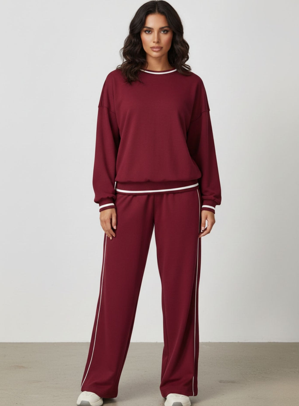 Vector Sportswear Lounge Strides pants featuring relaxed wide-leg fit, piping detail, and all-day comfort.