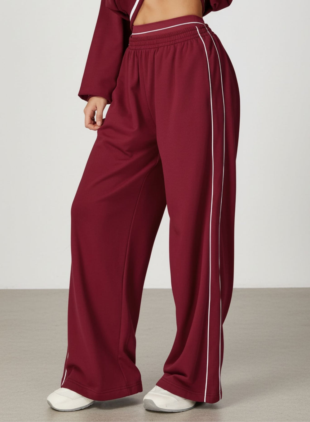 Vector Sportswear Lounge Strides pants featuring relaxed wide-leg fit, piping detail, and all-day comfort.