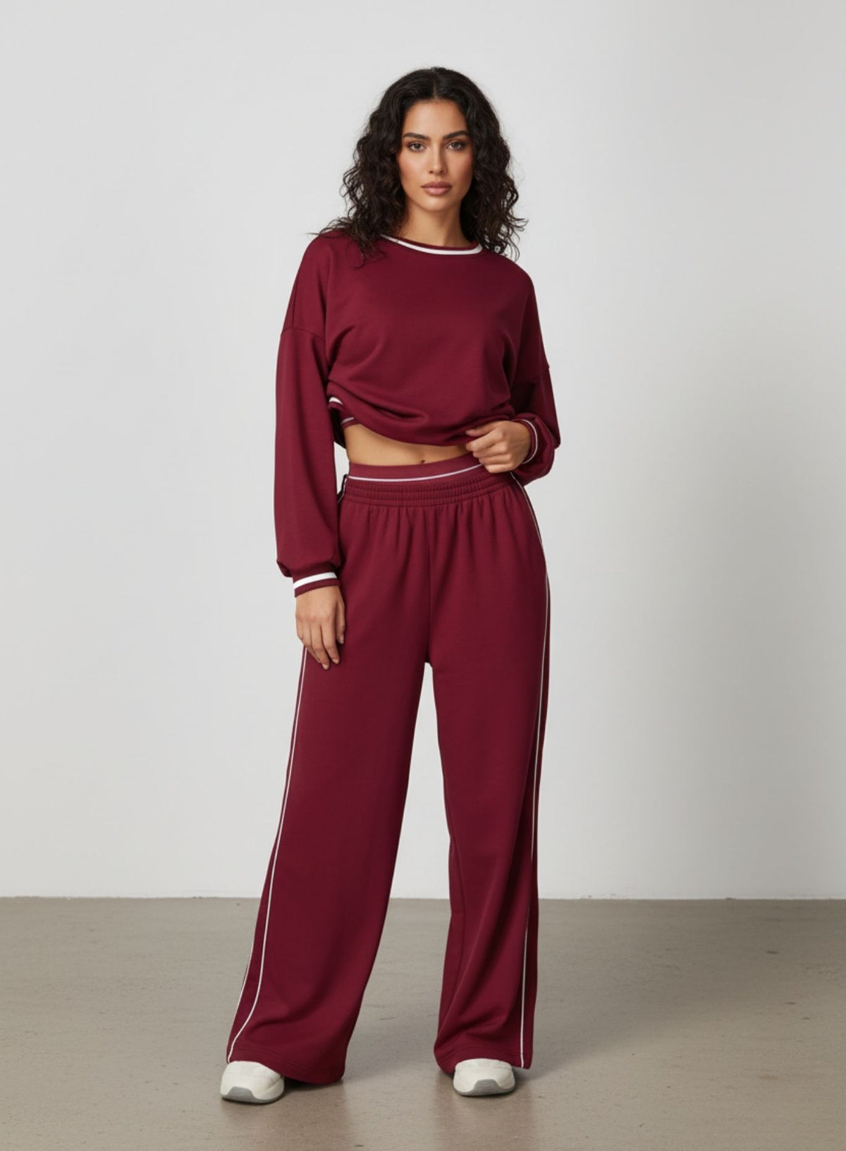 Vector Sportswear Lounge Strides pants featuring relaxed wide-leg fit, piping detail, and all-day comfort.