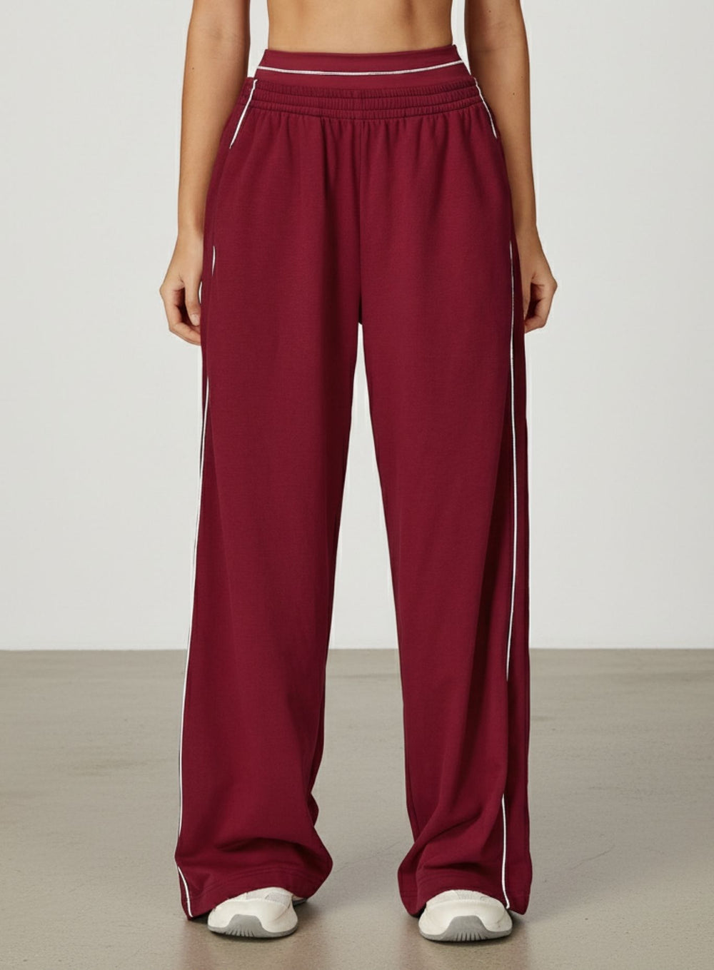 Vector Sportswear Lounge Strides pants featuring relaxed wide-leg fit, piping detail, and all-day comfort.