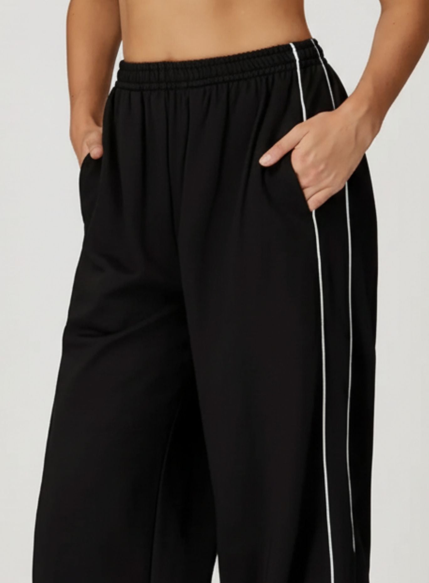 Vector Sportswear wide-leg lounge trousers with breathable fabric, elastic waistband, and versatile design.