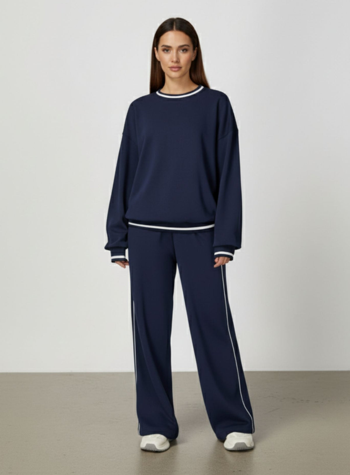 Vector Sportswear Lounge Strides wide-leg pants with elastic waist and piping detail for modern style.