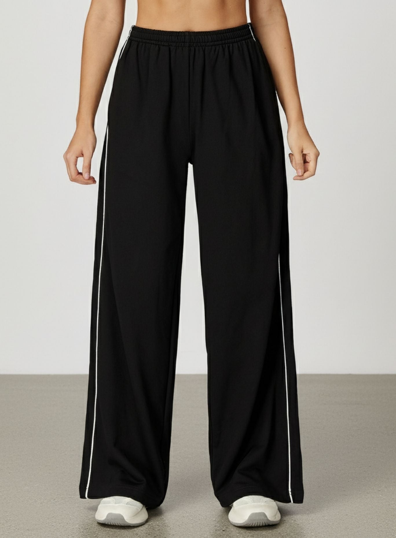 Vector Sportswear wide-leg lounge trousers with breathable fabric, elastic waistband, and versatile design.