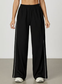 Vector Sportswear wide-leg lounge trousers with breathable fabric, elastic waistband, and versatile design.