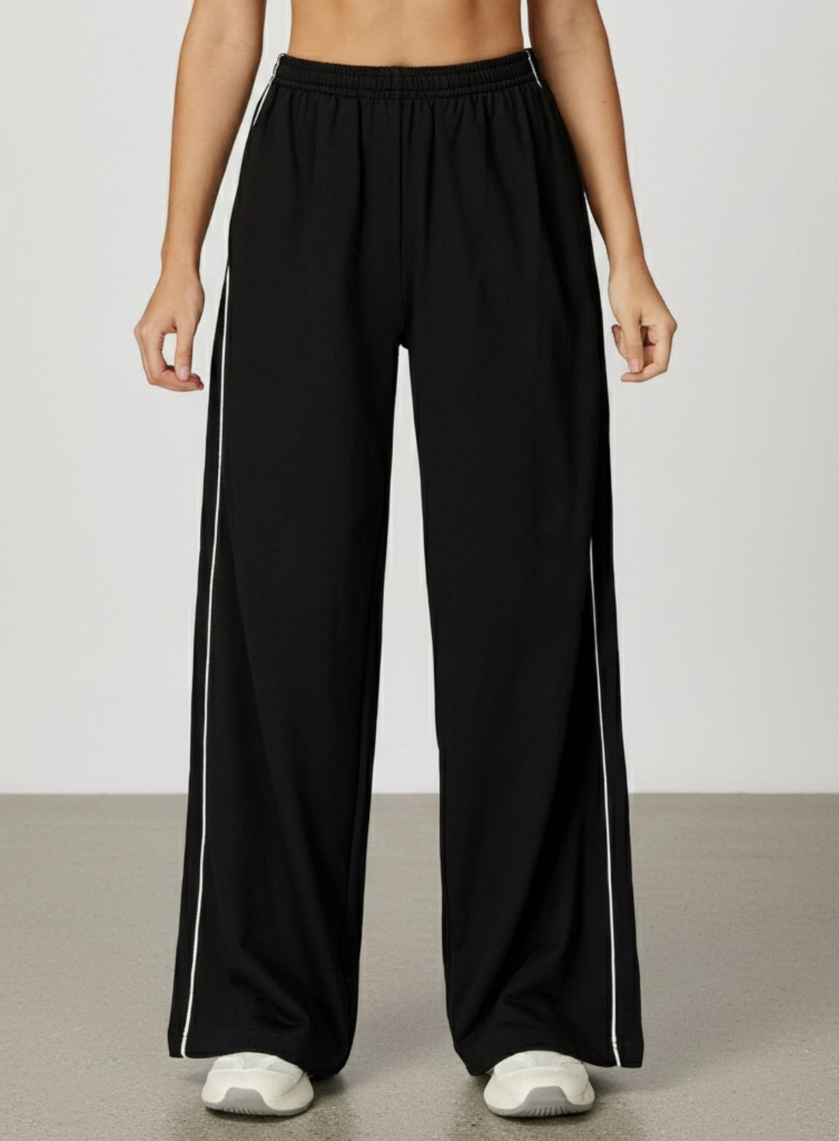 Vector Sportswear wide-leg lounge trousers with breathable fabric, elastic waistband, and versatile design.