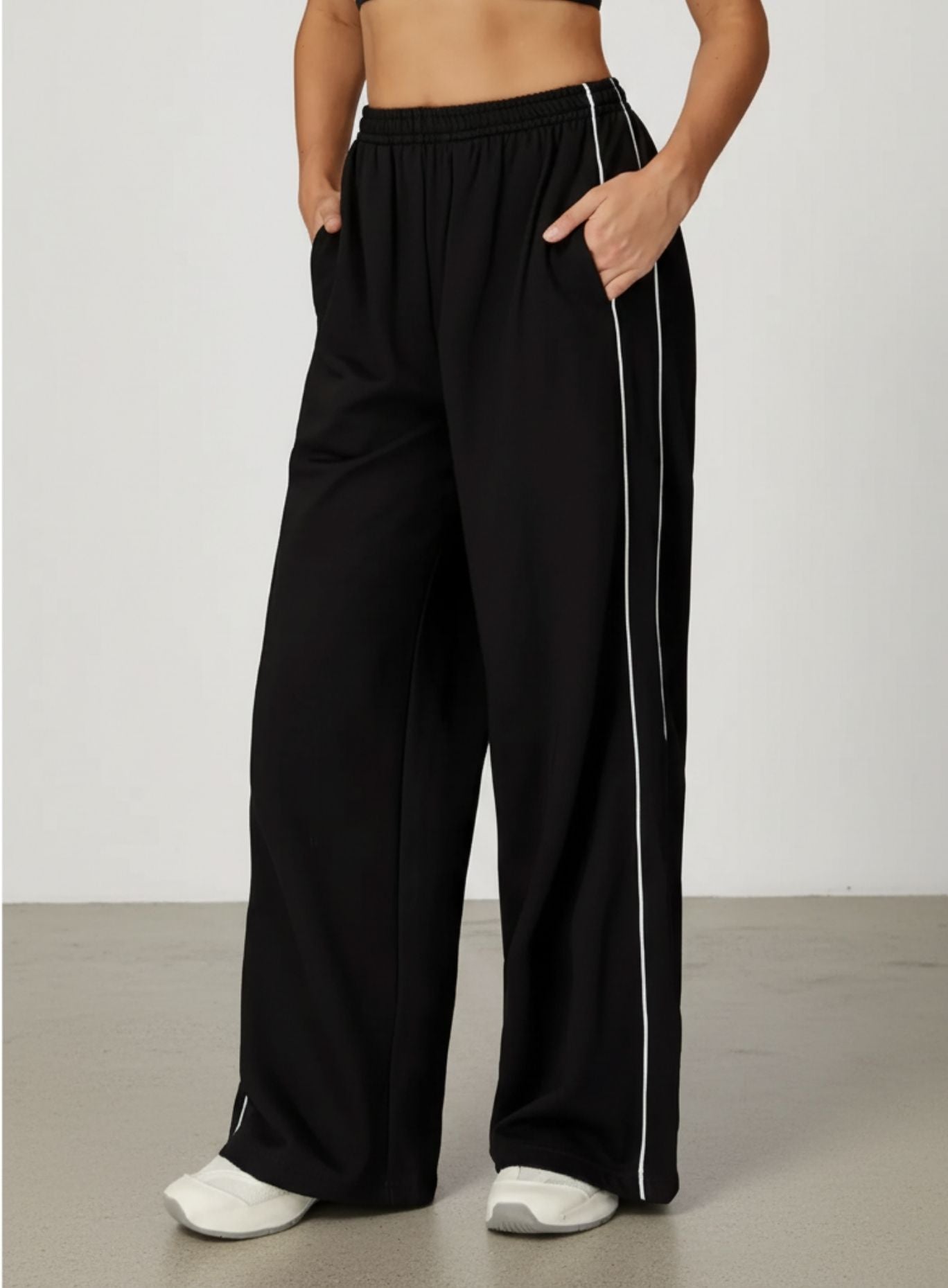 Vector Sportswear wide-leg lounge trousers with breathable fabric, elastic waistband, and versatile design.
