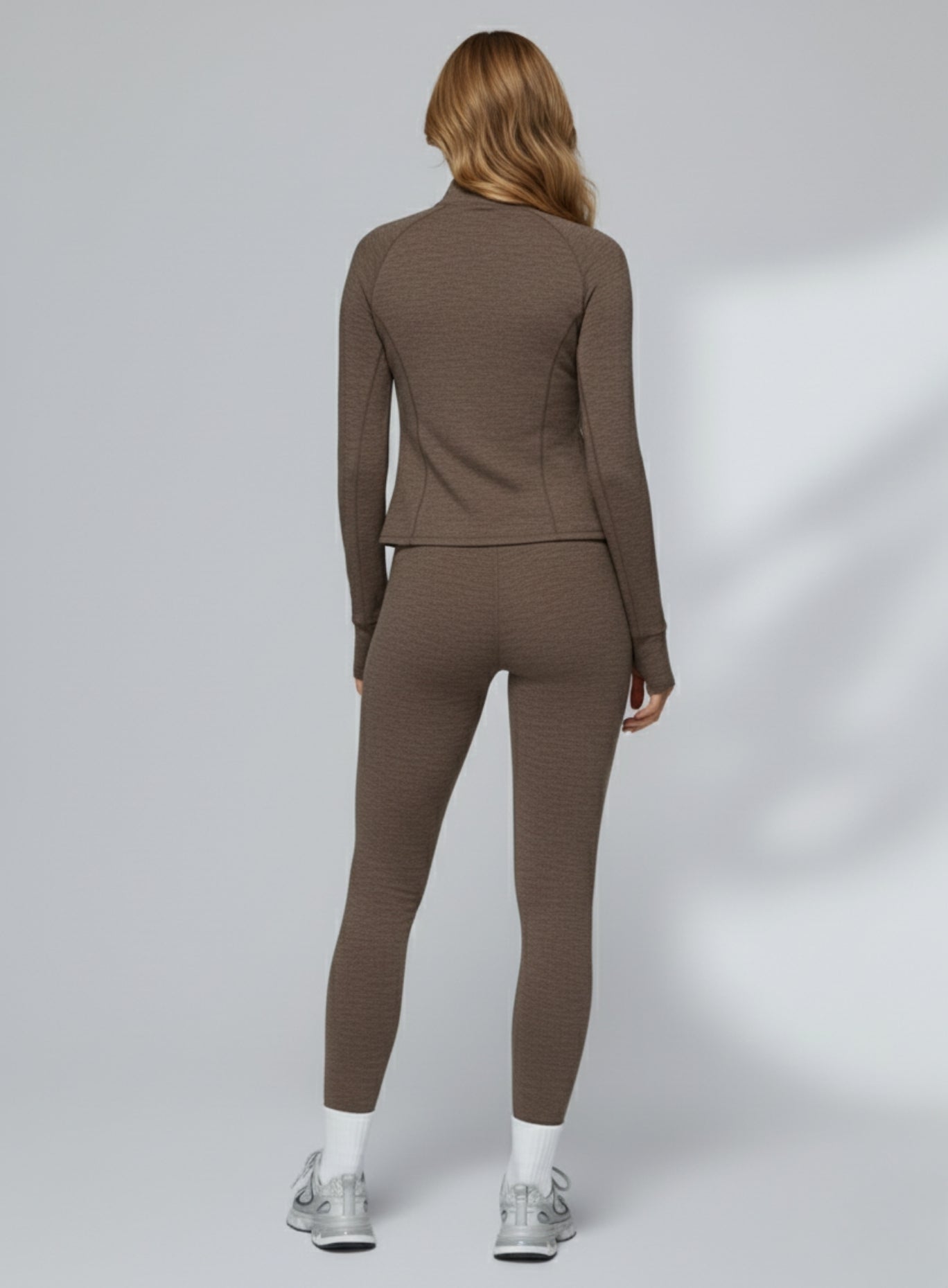 Athletic model in seamless brushed high-waist sculpt leggings, peach-lift and sweat-wicking | Vectorsportswear