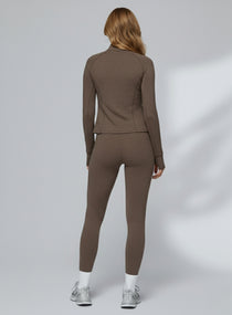 Athletic model in seamless brushed high-waist sculpt leggings, peach-lift and sweat-wicking | Vectorsportswear