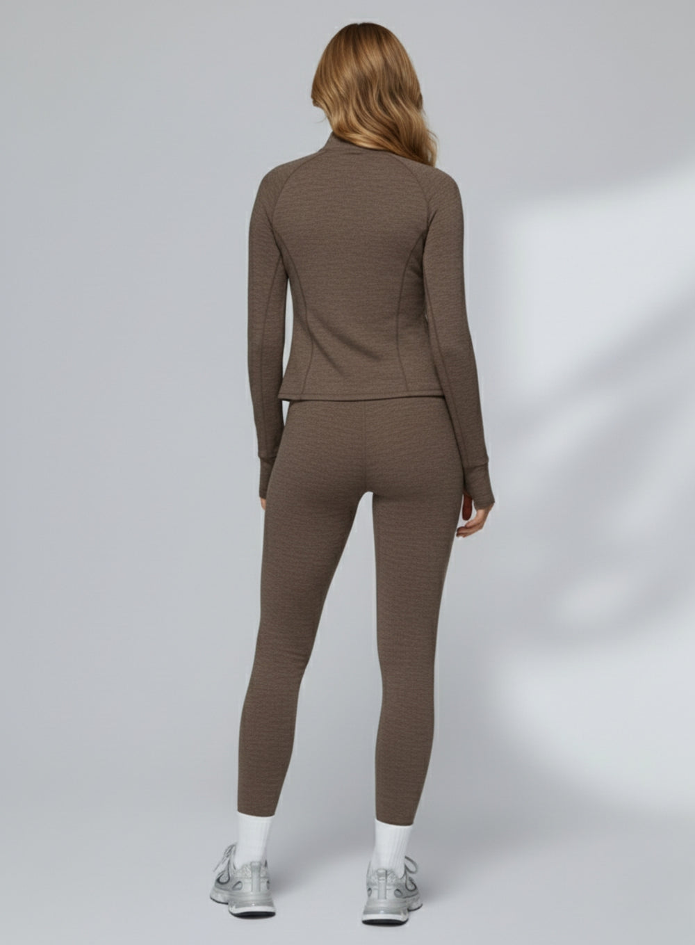 Athletic model in seamless brushed high-waist sculpt leggings, peach-lift and sweat-wicking | Vectorsportswear