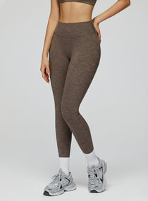 Athletic model in seamless brushed high-waist sculpt leggings, peach-lift and sweat-wicking | Vectorsportswear