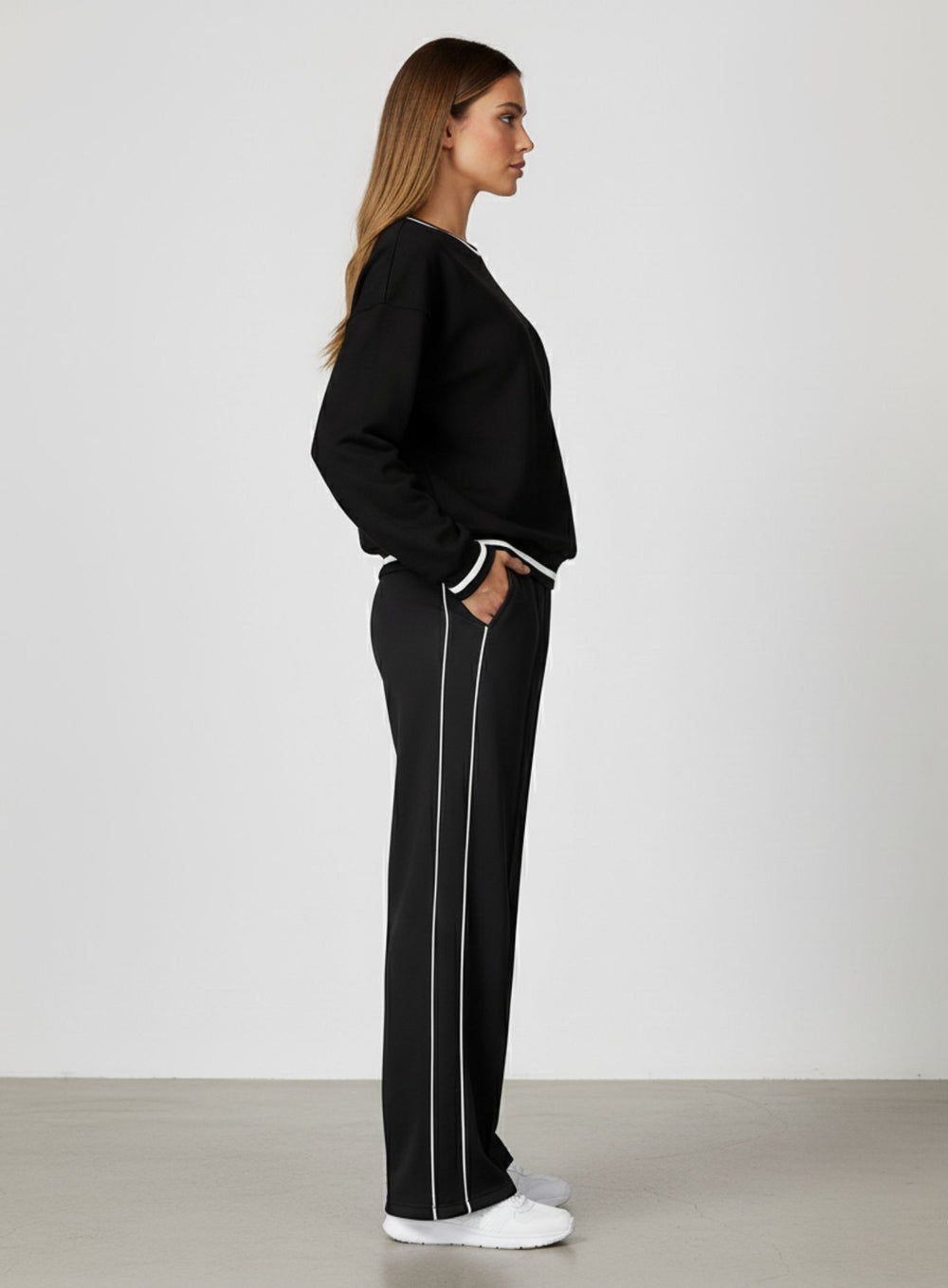 Vector Sportswear wide-leg lounge trousers with breathable fabric, elastic waistband, and versatile design.