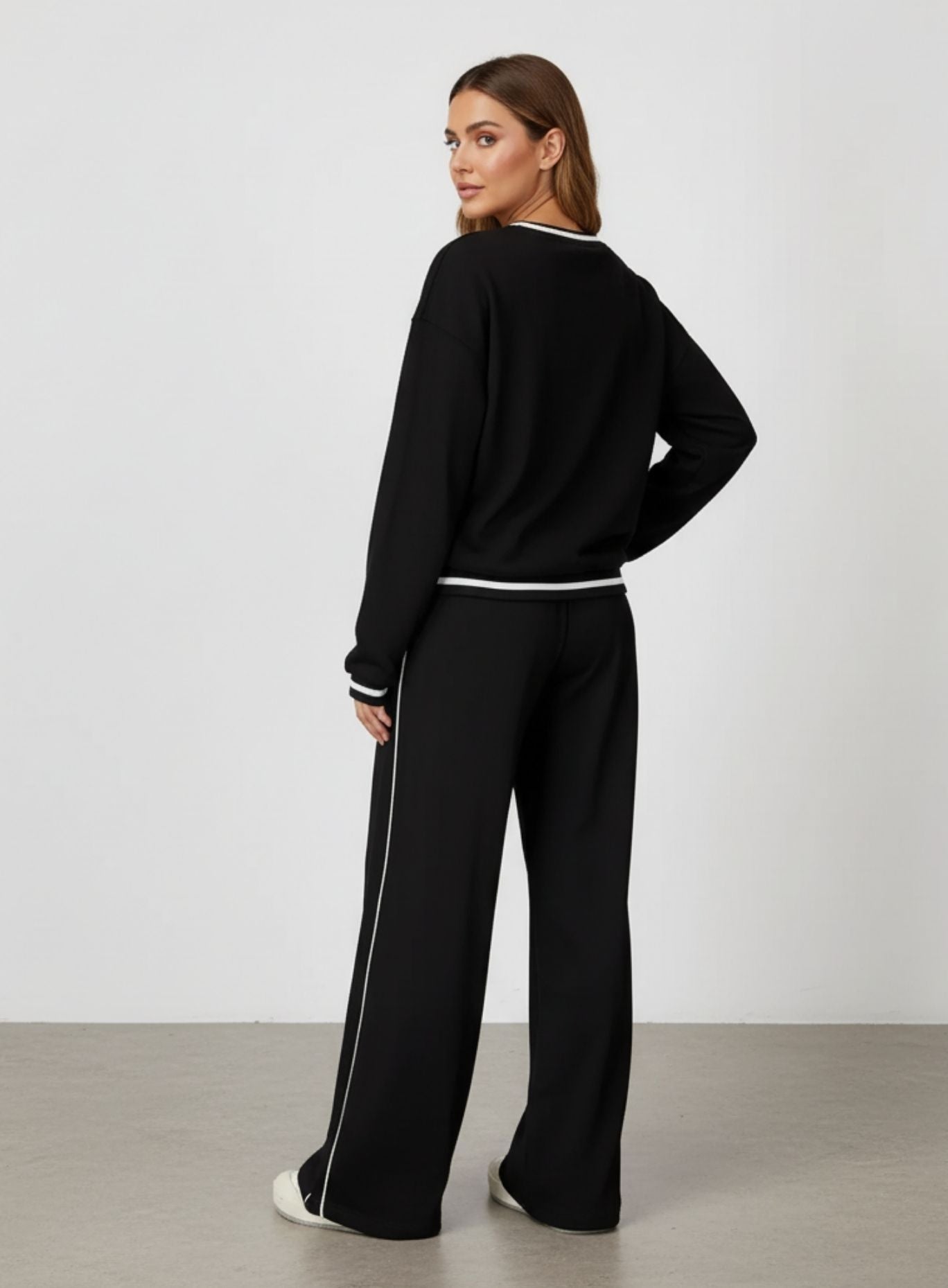 Vector Sportswear wide-leg lounge trousers with breathable fabric, elastic waistband, and versatile design.