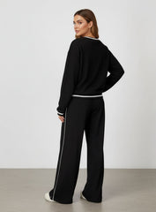 Vector Sportswear wide-leg lounge trousers with breathable fabric, elastic waistband, and versatile design.