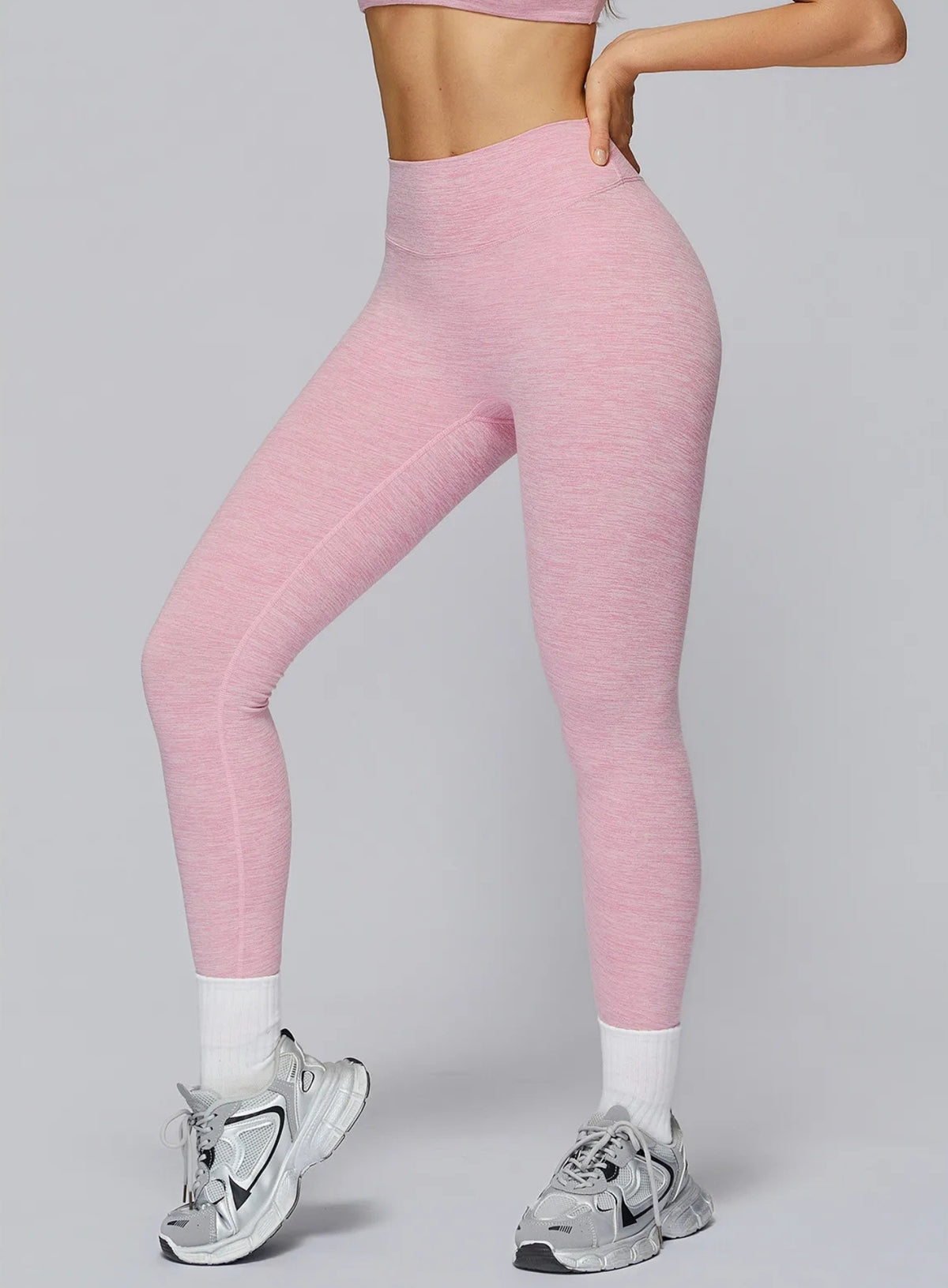 Athletic model in seamless brushed high-waist sculpt leggings, peach-lift and sweat-wicking | Vector Sportswear