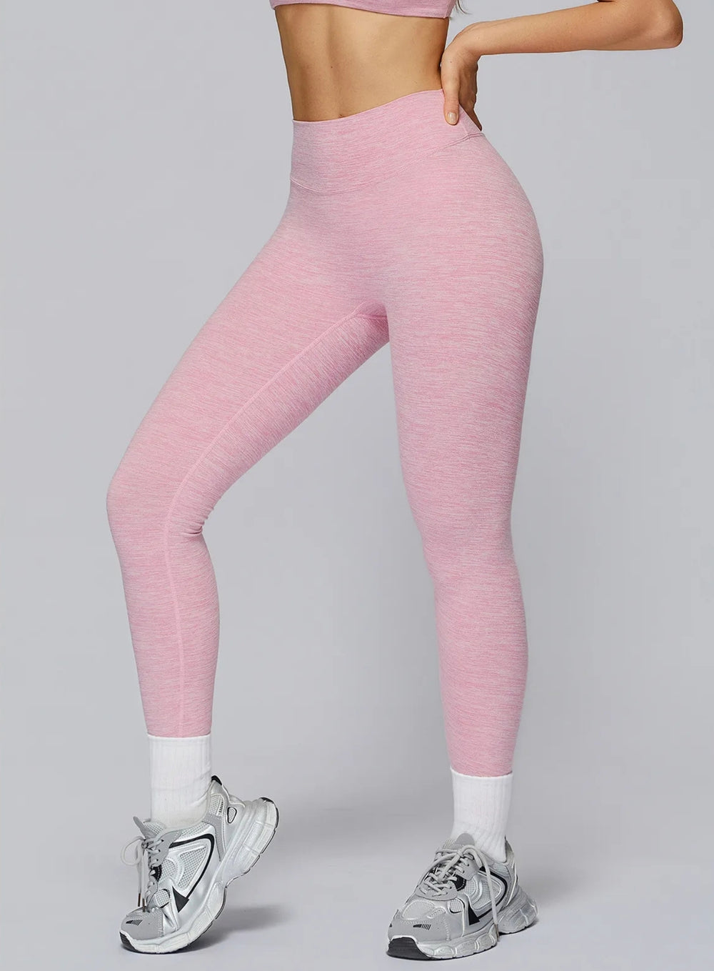 Athletic model in seamless brushed high-waist sculpt leggings, peach-lift and sweat-wicking | Vector Sportswear