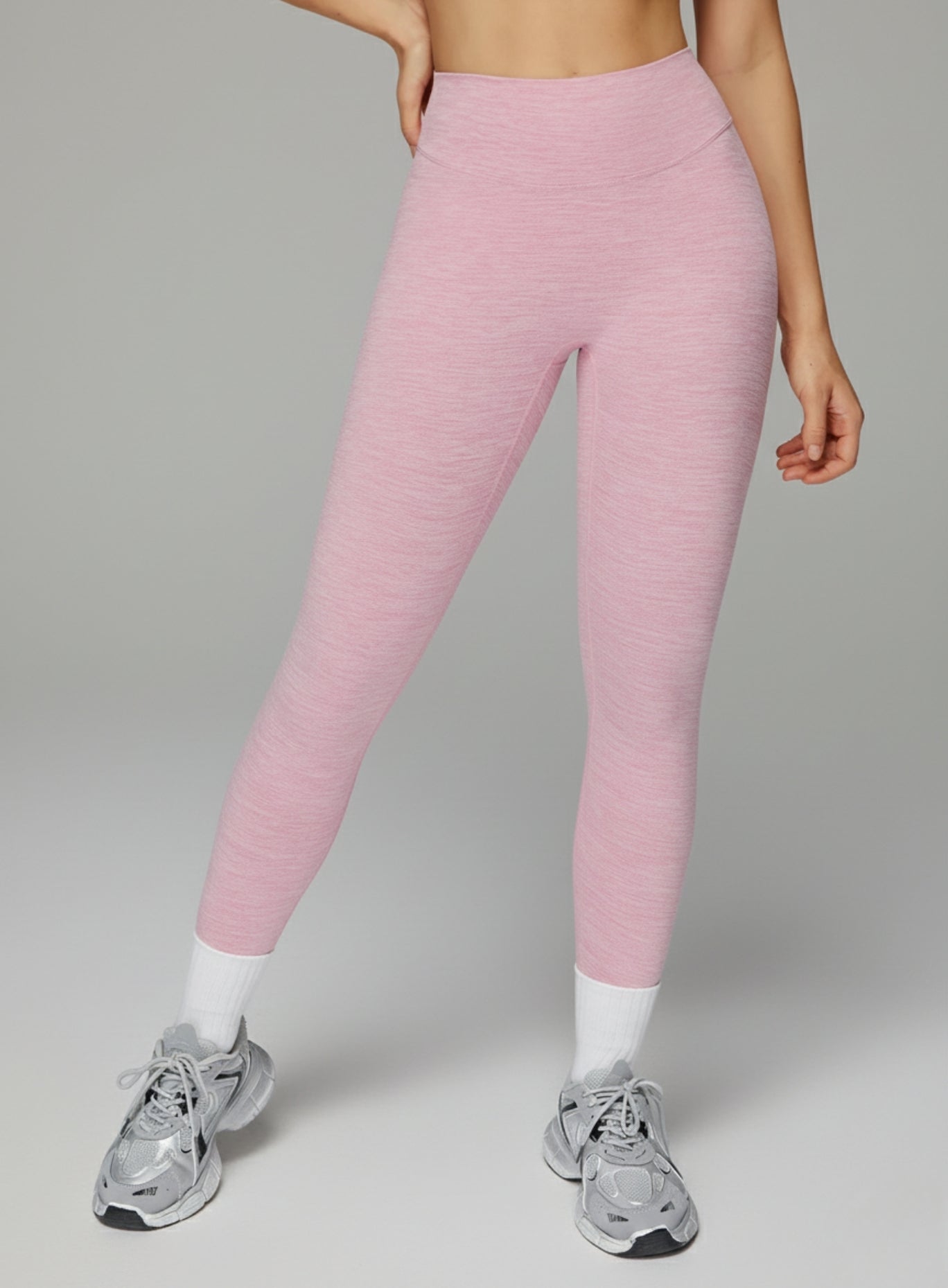 Athletic model in seamless brushed high-waist sculpt leggings, peach-lift and sweat-wicking | Vectorsportswear