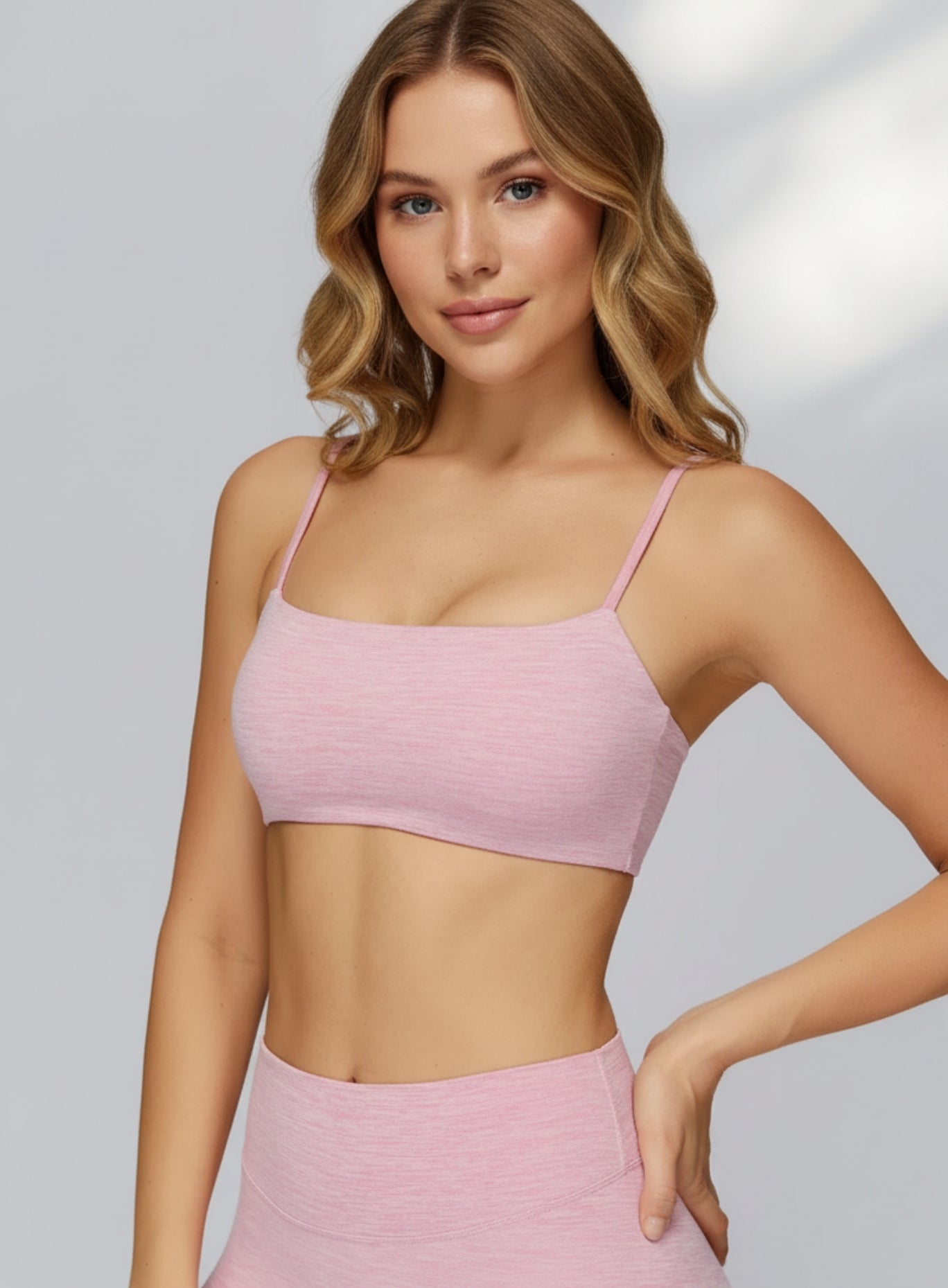 Front view of CloudSense Brushed Sports Bra in pink seamless design with smooth sculpting fit | Vectorsportswear