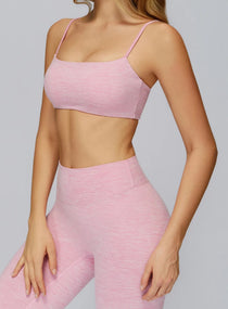 Pink seamless CloudSense sports bra on model, square neckline and soft brushed fabric for gym and yoga | Vectorsportswear