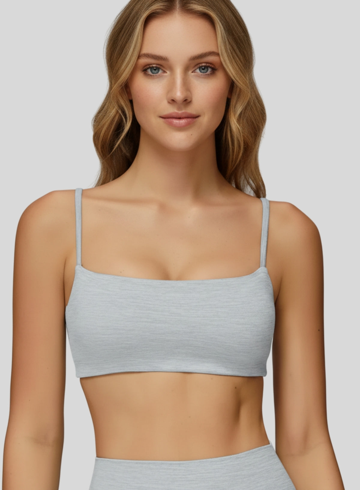 gray seamless CloudSense sports bra on model, square neckline and soft brushed fabric for gym and yoga | Vectorsportswear