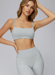 gray seamless CloudSense sports bra on model, square neckline and soft brushed fabric for gym and yoga | Vectorsportswear