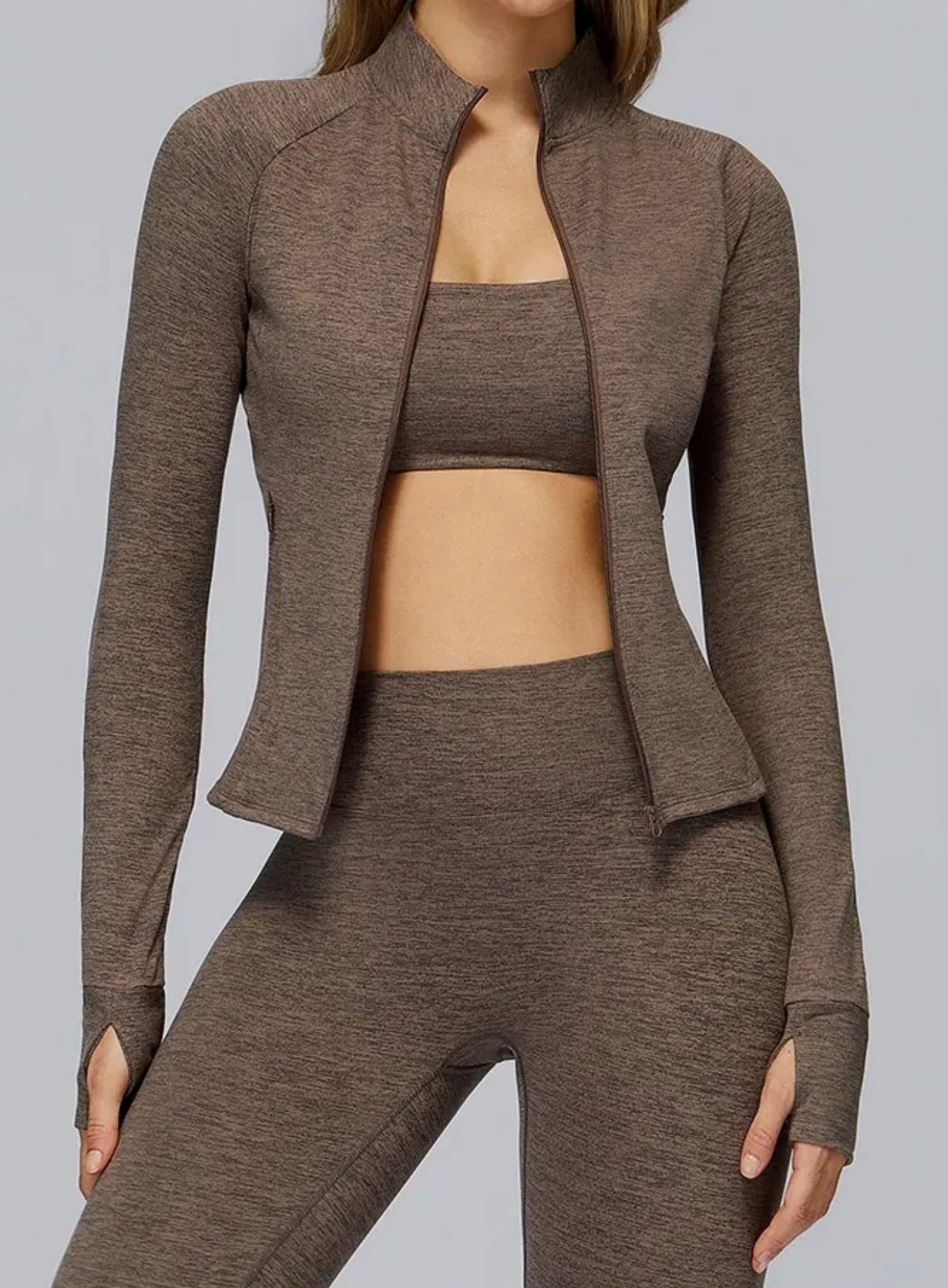 Ultra-soft seamless zip top for women — brushed finish, sculpted fit, quick-dry & 4-way stretch. Ideal for training, yoga, and athleisure. | Vector Sportswear