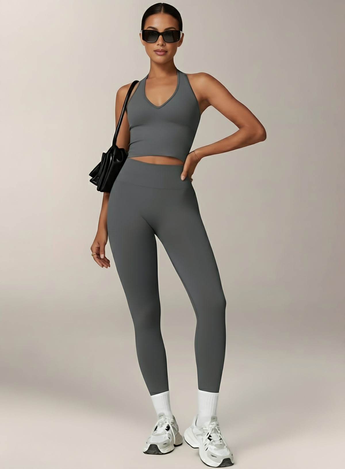 Vector Sportswear Essential Crop Top – Dark Gray, sleek V-neck activewear top designed for comfort, style, and movement.