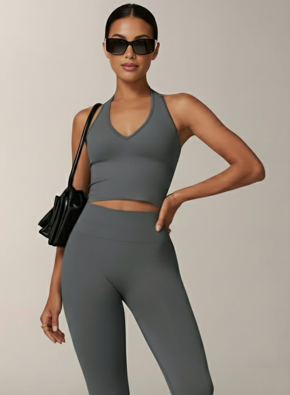 Vector Sportswear Essential Crop Top – Dark Gray, sleek V-neck activewear top designed for comfort, style, and movement.