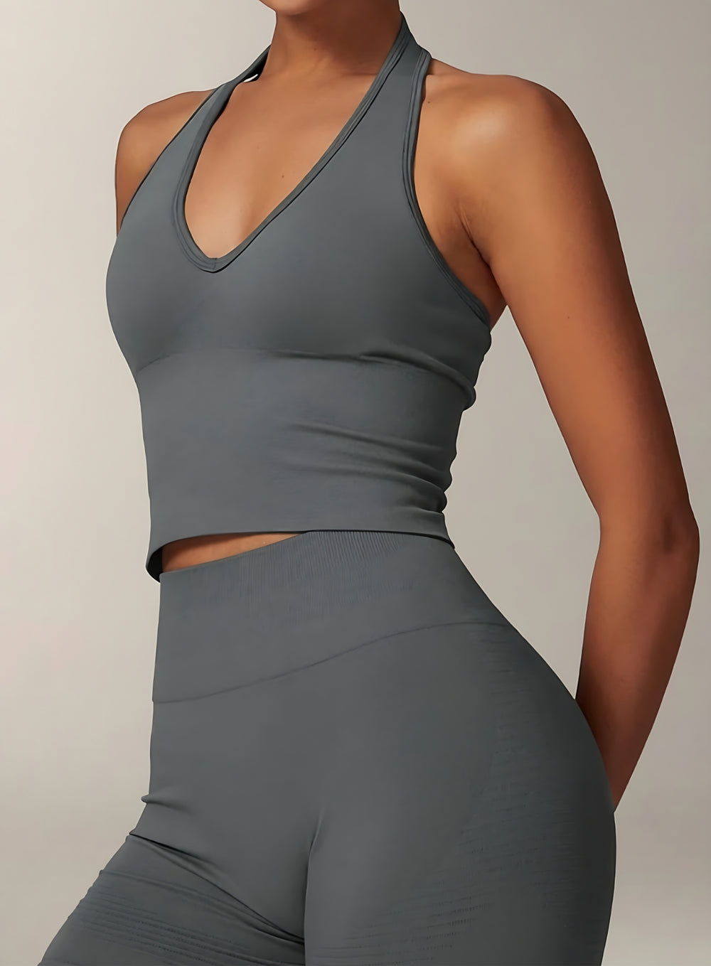 Vector Sportswear Essential Crop Top – Dark Gray, sleek V-neck activewear top designed for comfort, style, and movement.