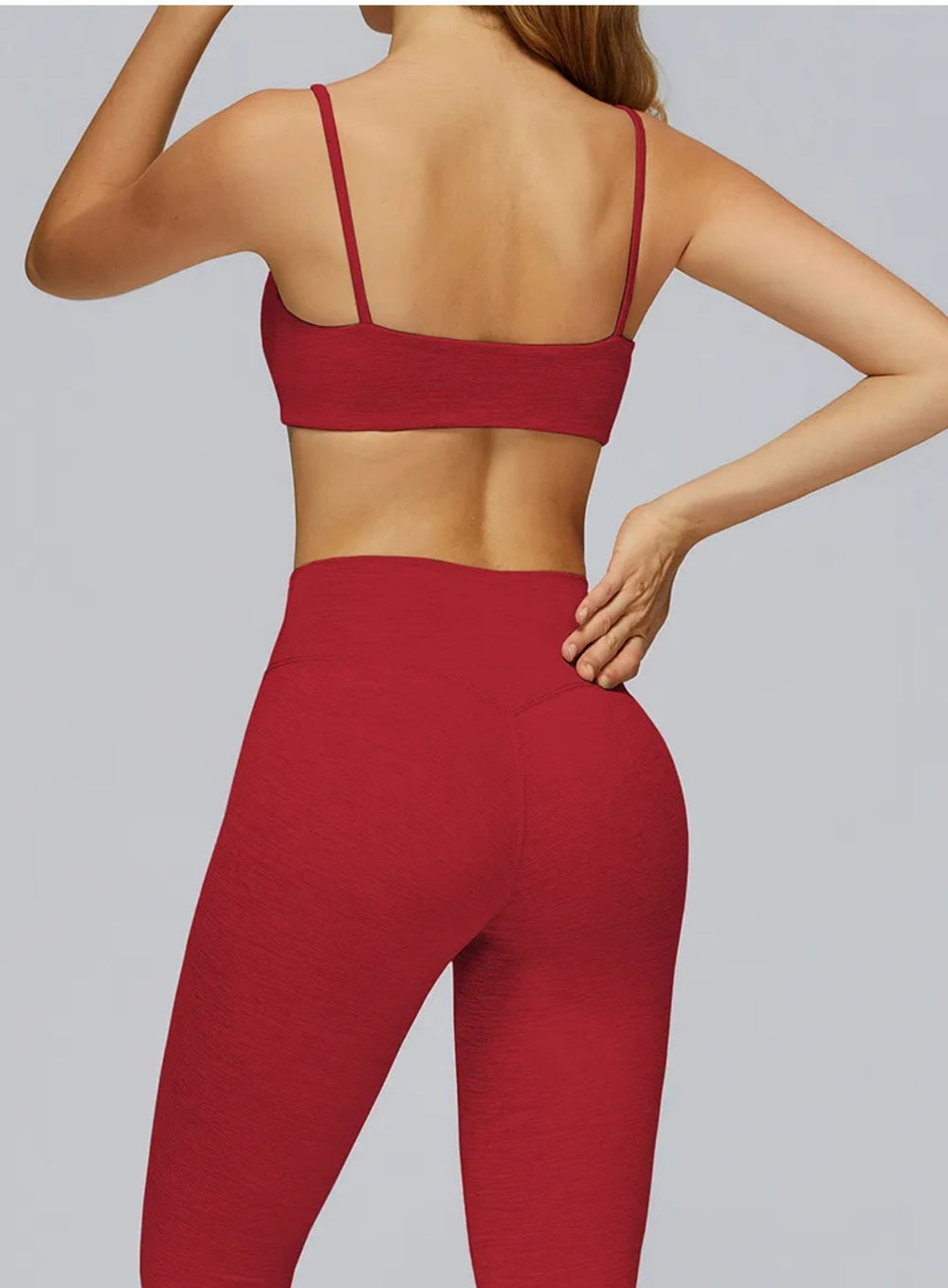 Back view of CloudSense Brushed Sports Bra in bright red with seamless rib band and slim straps | Vectorsportswear
