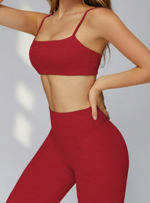 Side profile of model wearing CloudSense Brushed Sports Bra in bright red seamless brushed fabric | Vectorsportswear